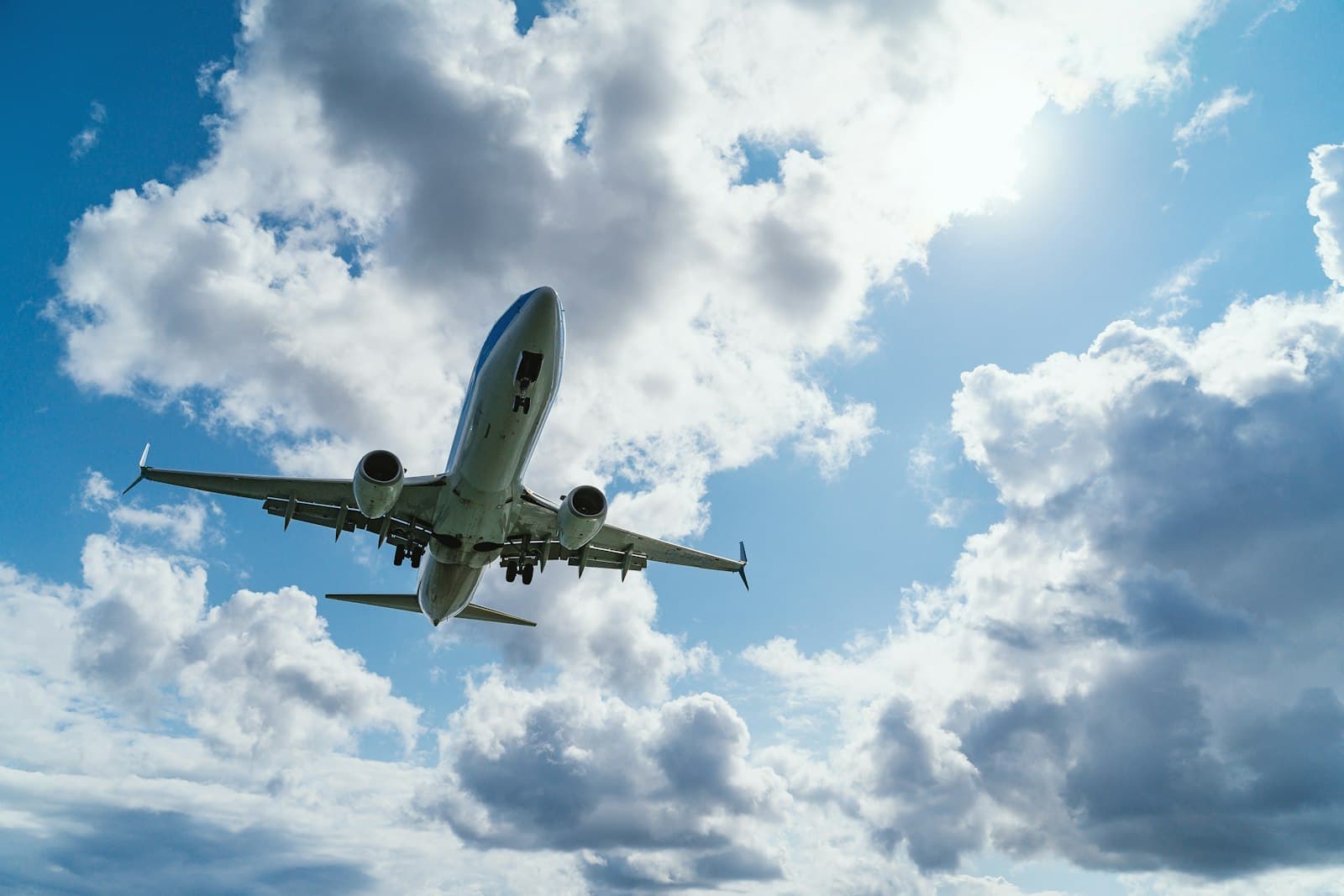 A cargo plane flying through clouds